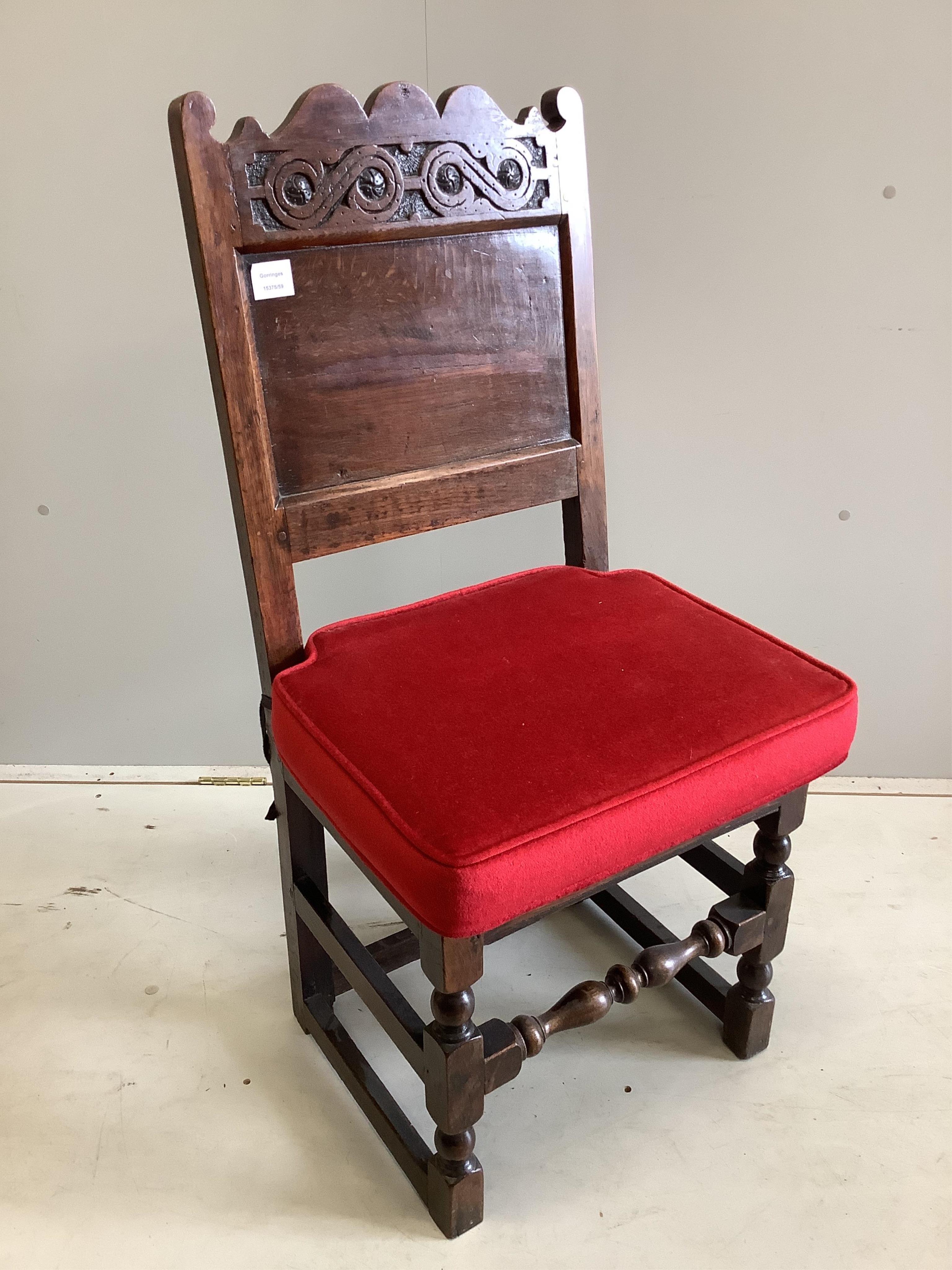 A late 17th century oak back chair, width 45cm, depth 42cm, height 103cm. Condition - fair